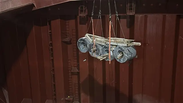 Steel coils lifted inside the hold
