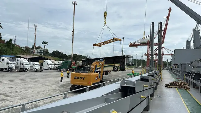 View from the deck over the pier, with trucks waiting
